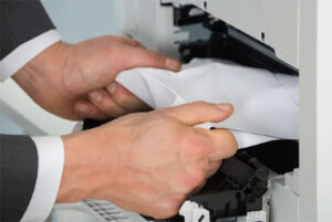 como solucionar un atasco de papel en la impresora